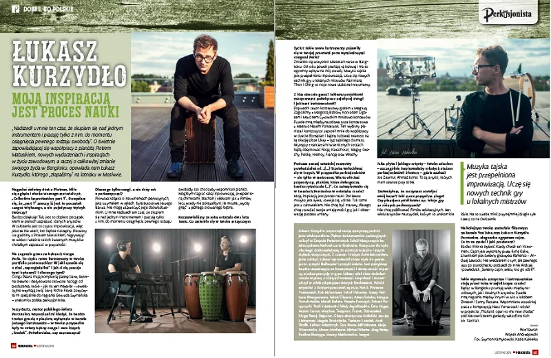 Two-page Polish magazine interview with Łukasz Kurzydło, with photos of him at a cajón and in the studio